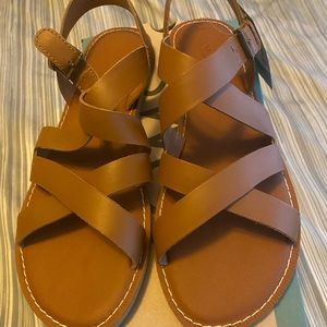 Toms brown flat sandals never worn